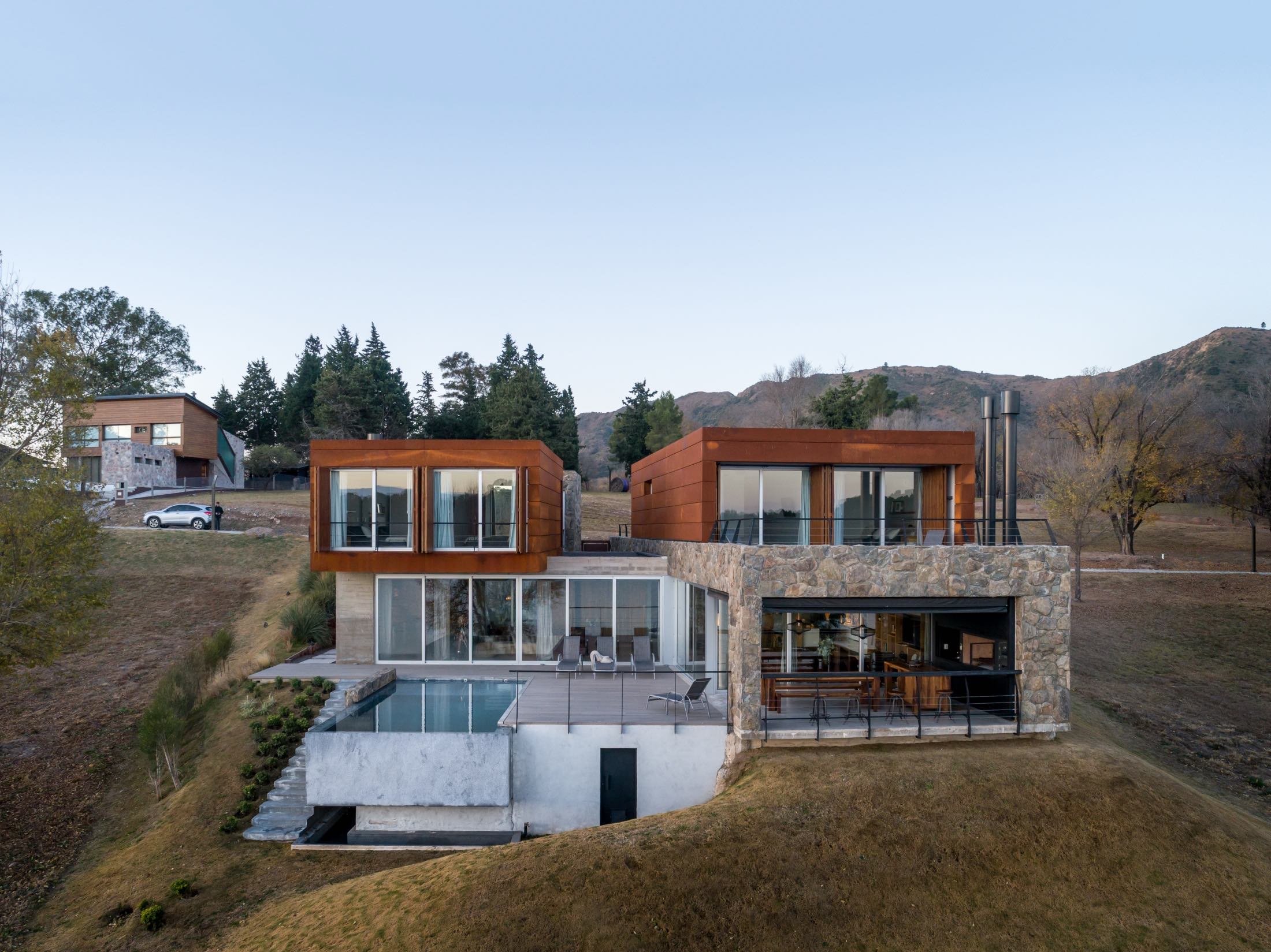 hillside house with pool